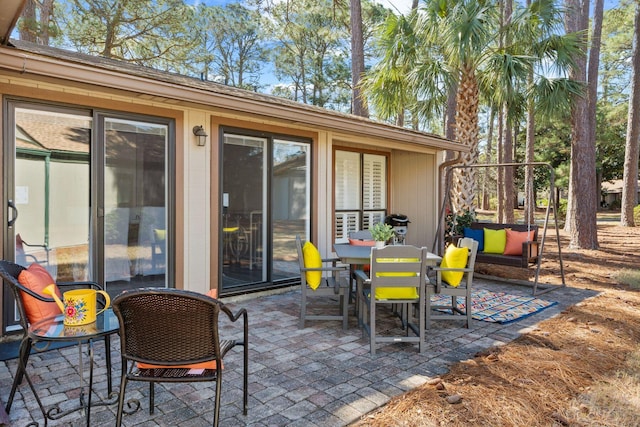 view of patio with outdoor dining area