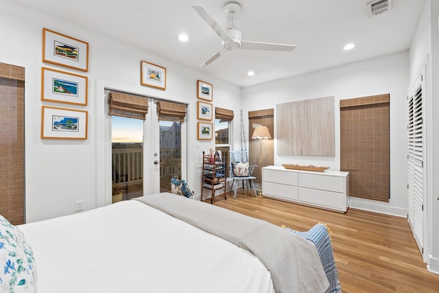 bedroom featuring ceiling fan, recessed lighting, visible vents, light wood-style floors, and access to exterior