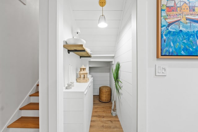 interior space with light wood-type flooring and stairs