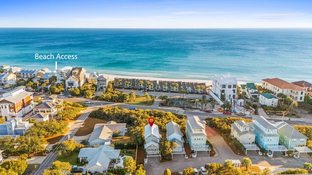 bird's eye view with a water view and a residential view