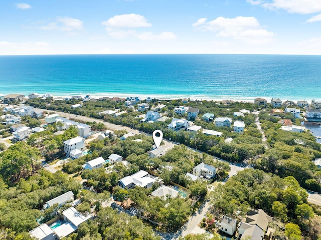 bird's eye view featuring a water view and a residential view