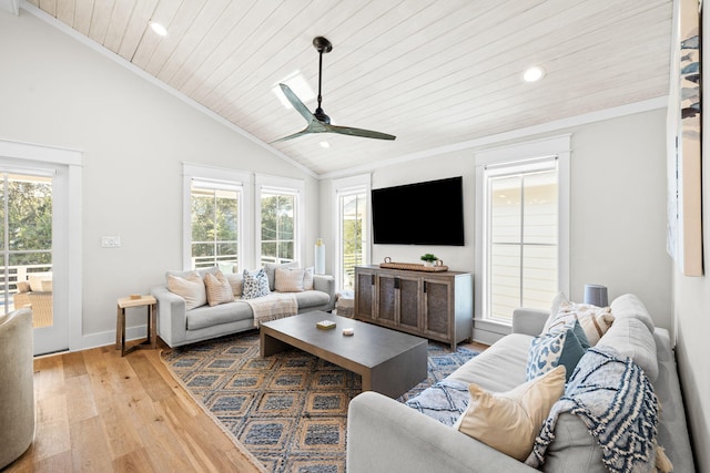 living area with light wood finished floors, wood ceiling, vaulted ceiling, and crown molding