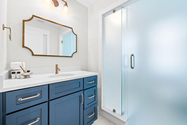 bathroom featuring a stall shower and vanity