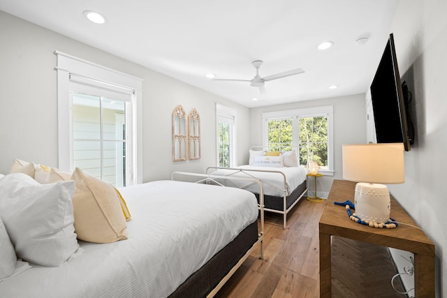 bedroom featuring ceiling fan, hardwood / wood-style floors, and recessed lighting