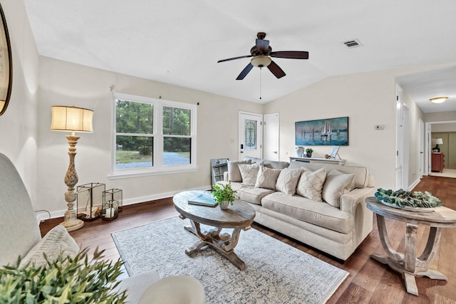 5241 Bob Sikes Rd, Defuniak Springs, FL 32435 - living area with dark wood-style flooring, ceiling fan, baseboards, and vaulted ceiling