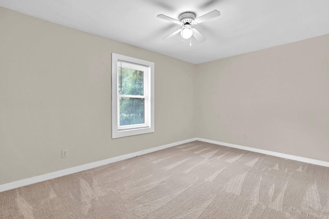 5241 Bob Sikes Rd, Defuniak Springs, FL 32435 - spare room featuring ceiling fan, light carpet, and baseboards