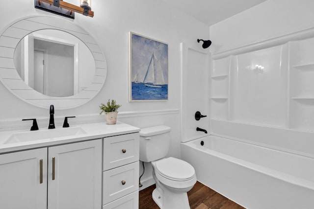 5241 Bob Sikes Rd, Defuniak Springs, FL 32435 - full bathroom featuring vanity, wood finished floors, toilet, and tub / shower combination