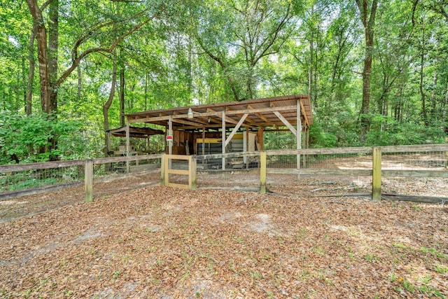 5241 Bob Sikes Rd, Defuniak Springs, FL 32435 - view of yard featuring an outbuilding and an exterior structure