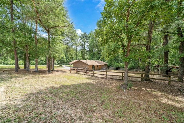 5241 Bob Sikes Rd, Defuniak Springs, FL 32435 - view of yard featuring an outbuilding and an exterior structure