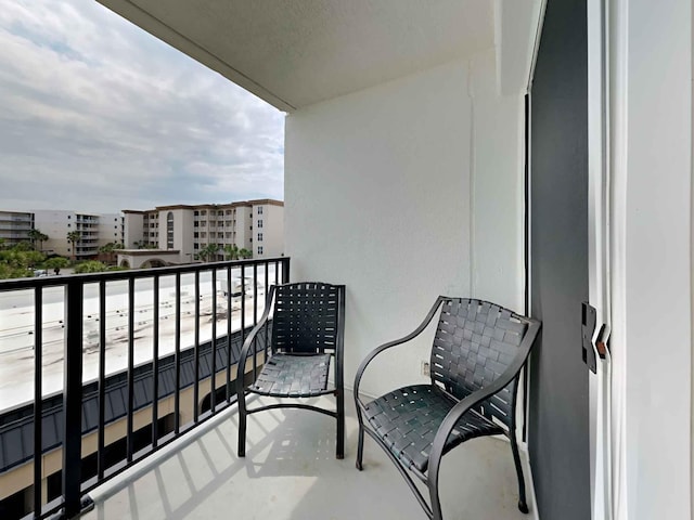 balcony featuring a city view