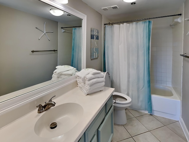 full bathroom with visible vents, toilet, shower / tub combo, vanity, and tile patterned flooring