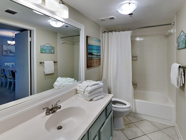 full bath featuring visible vents, vanity, toilet, and tile patterned floors