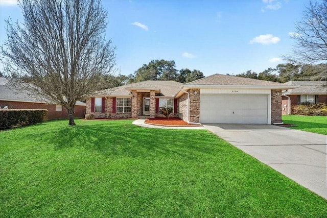 ranch-style house featuring a front yard, concrete driveway, brick siding, and an attached garage