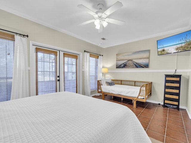 tiled bedroom with visible vents, a ceiling fan, access to outside, crown molding, and french doors