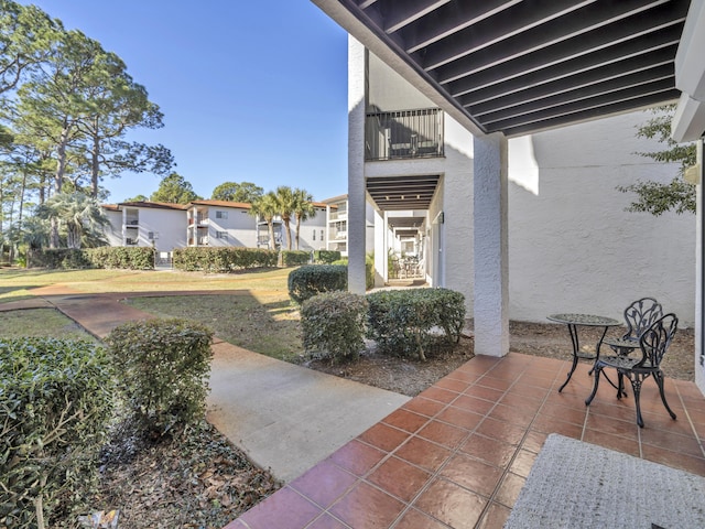 view of patio / terrace featuring a balcony