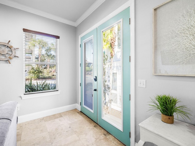 doorway featuring ornamental molding, french doors, and baseboards