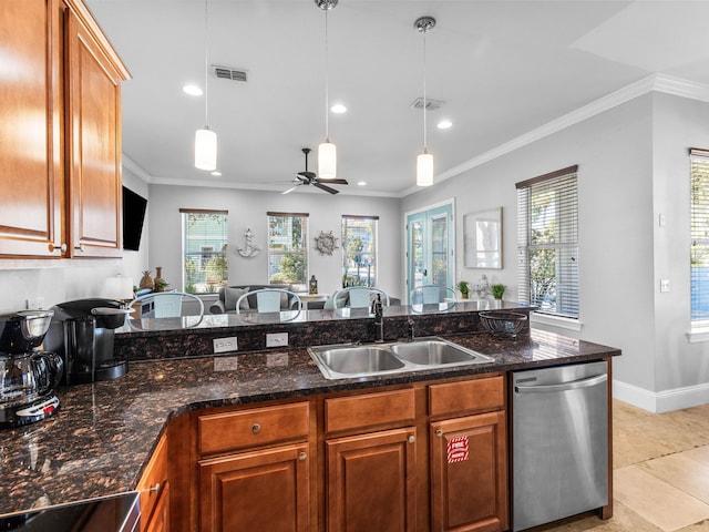 kitchen with crown molding, a sink, visible vents, dishwasher, and pendant lighting