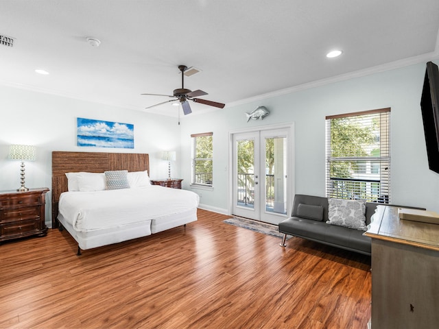 bedroom with french doors, crown molding, visible vents, wood finished floors, and access to outside