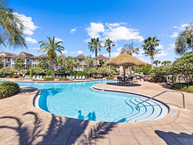 pool featuring a patio area