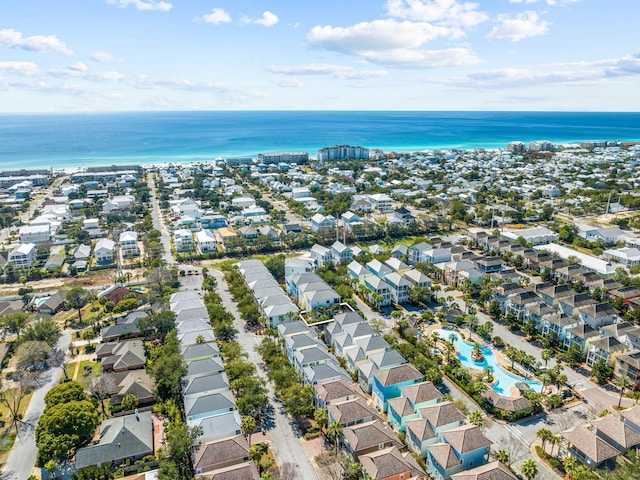 drone / aerial view featuring a water view and a residential view