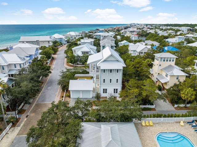 bird's eye view featuring a residential view and a water view