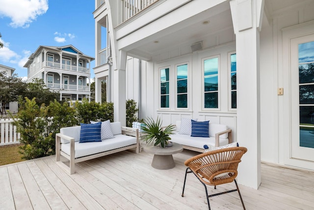 deck featuring outdoor lounge area