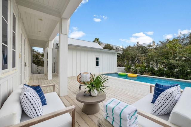 deck with an outdoor pool