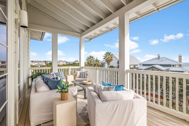 wooden deck with an outdoor hangout area