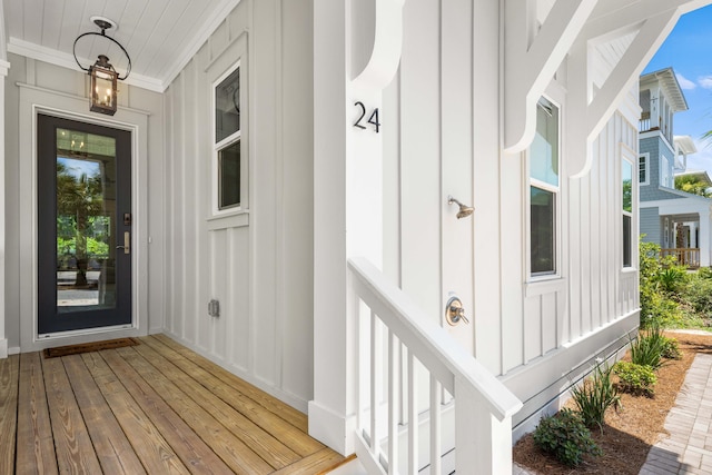 doorway to property with board and batten siding