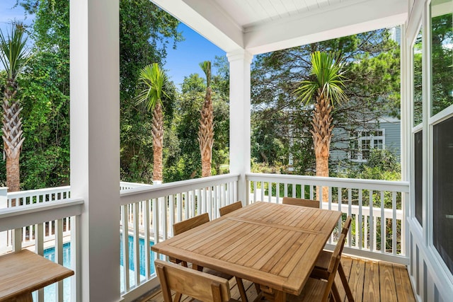 balcony featuring outdoor dining space