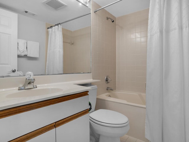 full bath featuring toilet, shower / bath combo, vanity, and visible vents