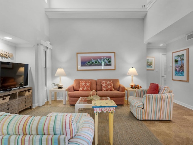 living room with recessed lighting, visible vents, a towering ceiling, ornamental molding, and baseboards