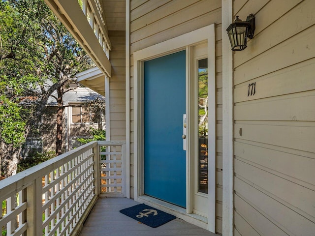 property entrance with a balcony