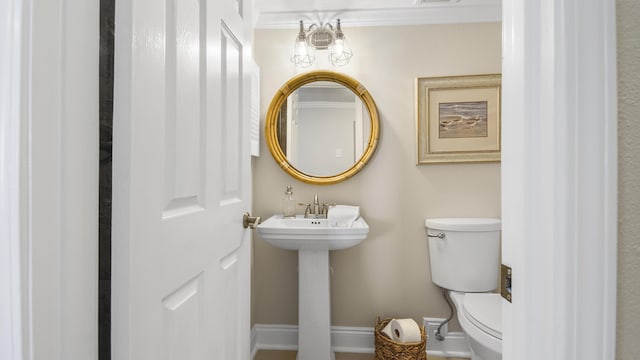 bathroom featuring toilet and a sink