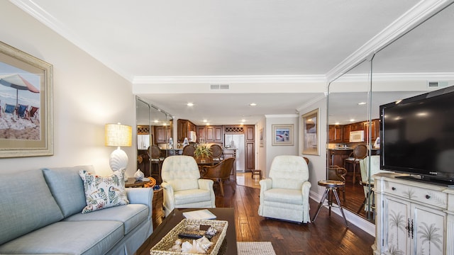 living area with visible vents, baseboards, recessed lighting, dark wood-type flooring, and crown molding