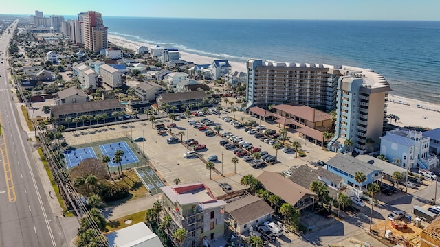 birds eye view of property with a city view and a water view