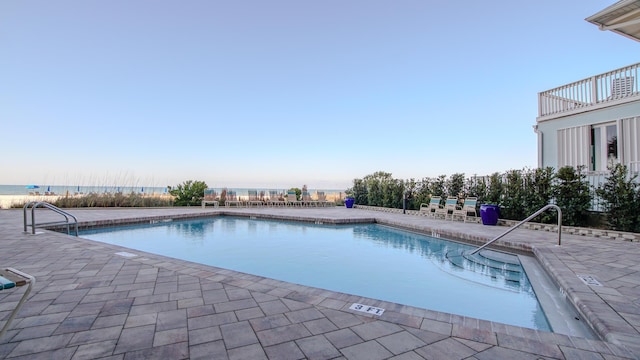 pool with a patio area