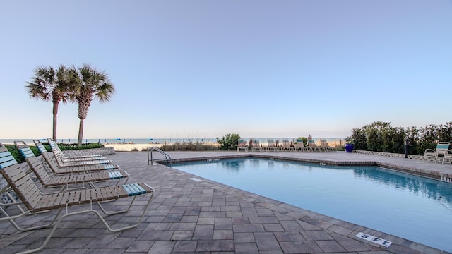 community pool with a patio