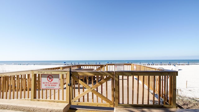 view of home's community with a view of the beach and a water view