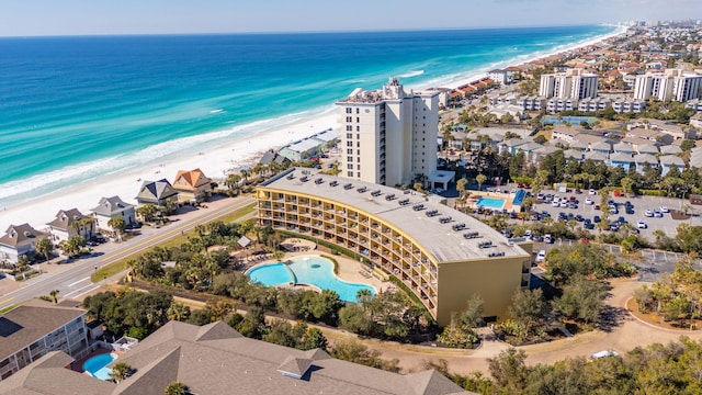 aerial view featuring a view of the beach and a water view