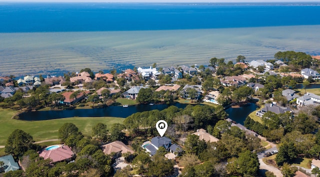 bird's eye view with a residential view and a water view