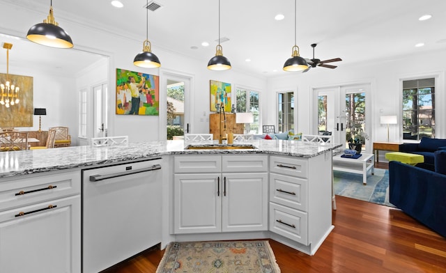 kitchen with crown molding, open floor plan, dishwasher, dark wood-style floors, and white cabinets