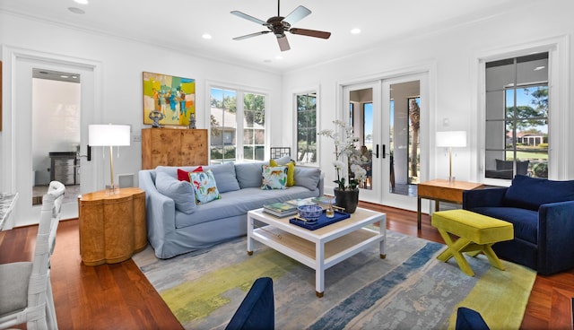 living room with recessed lighting, french doors, wood finished floors, and ornamental molding