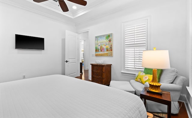 bedroom featuring ceiling fan, recessed lighting, wood finished floors, and ornamental molding