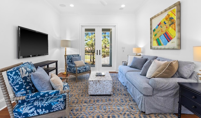 living area with ornamental molding, wood finished floors, recessed lighting, french doors, and baseboards