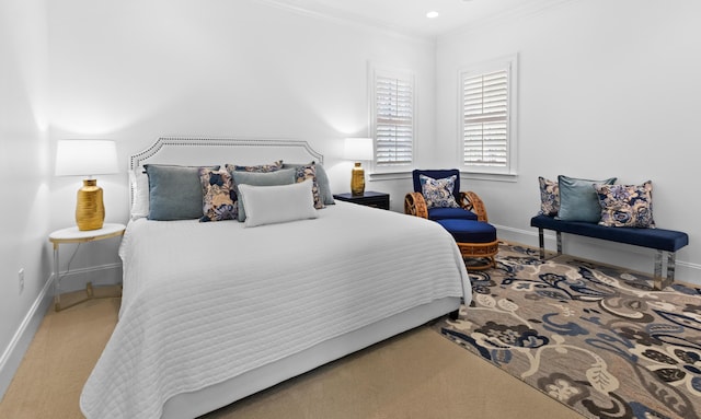 carpeted bedroom with crown molding, recessed lighting, and baseboards