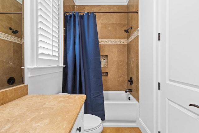 bathroom featuring shower / bath combination with curtain, toilet, and vanity