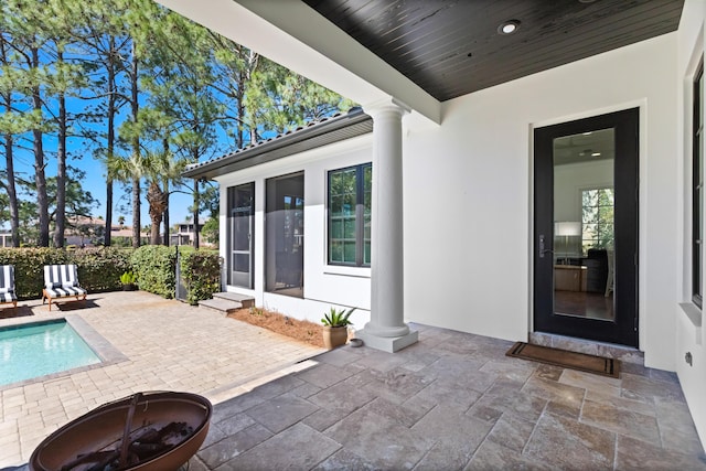 view of pool with a fenced in pool and a patio