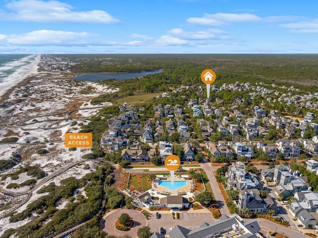 bird's eye view featuring a water view and a residential view