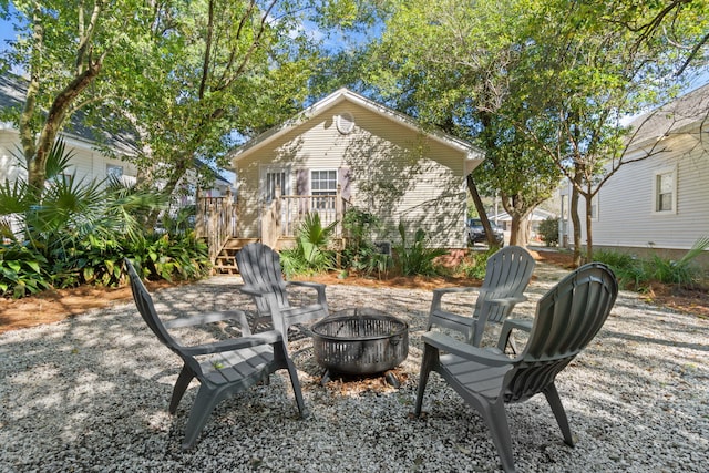 view of patio featuring a fire pit